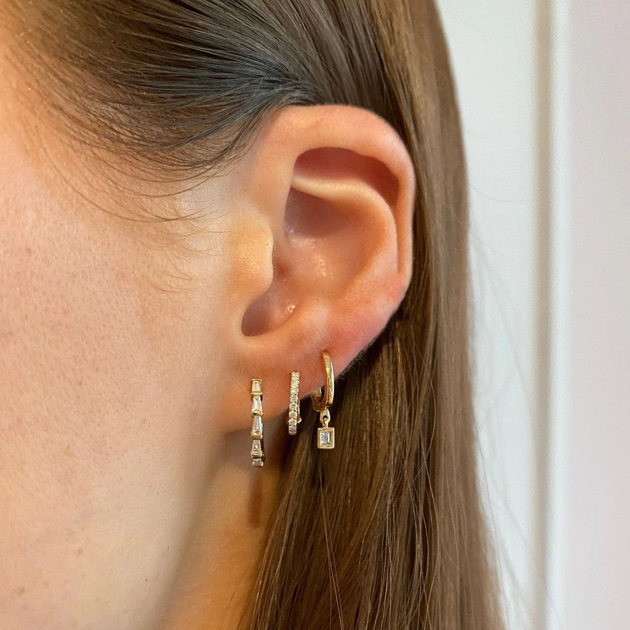 14K Rose Gold Baguette Huggie Earrings - Image 2