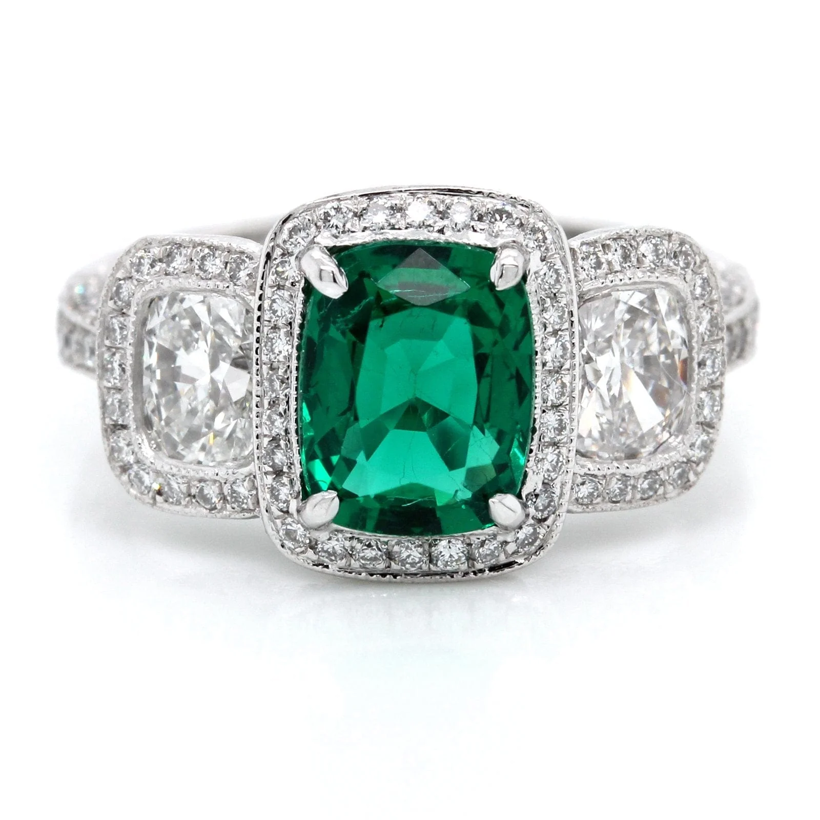 Platinum Three-Stone Emerald and Diamond Halo Ring - Image 2