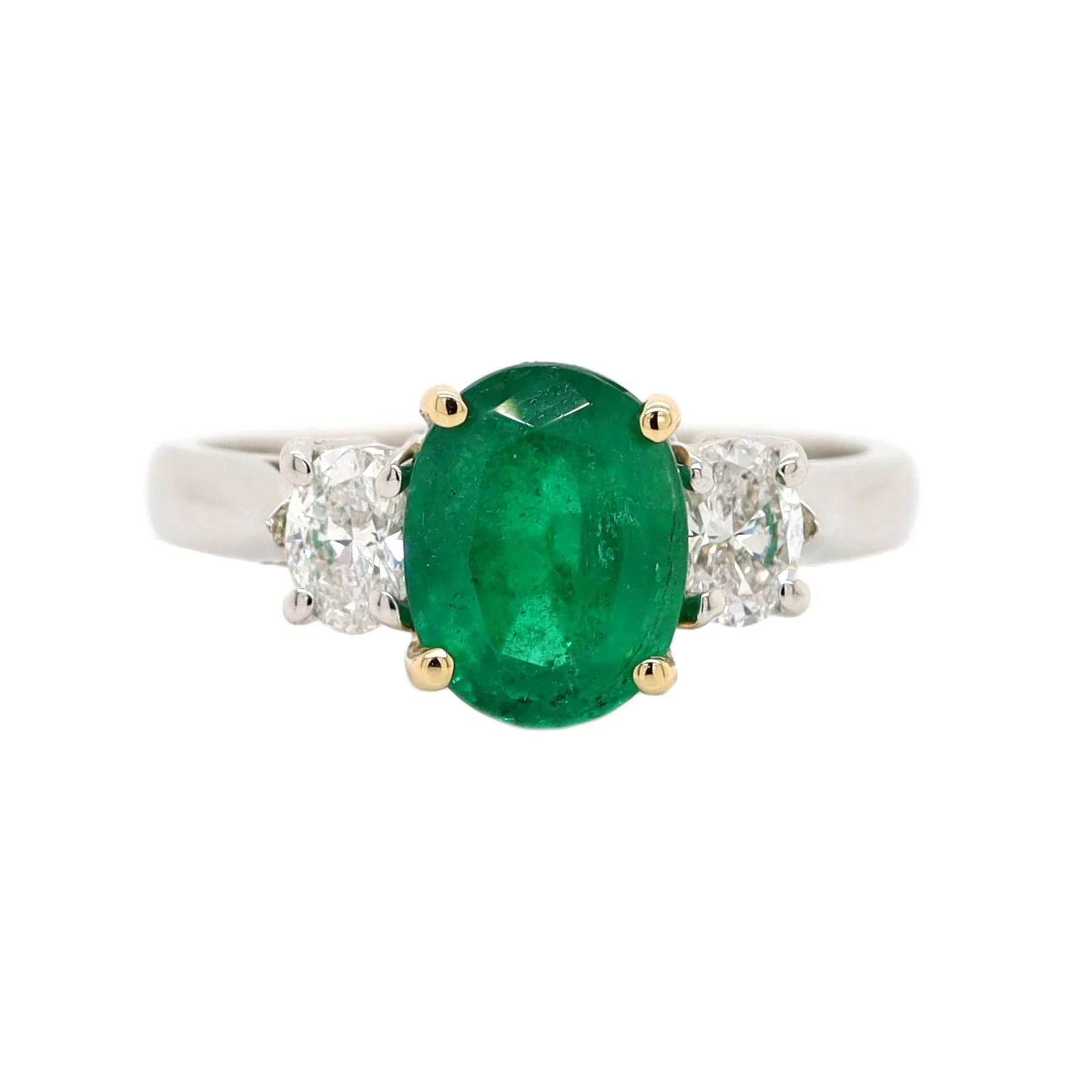 Platinum 3 Stone Oval Emerald and Diamond Ring
