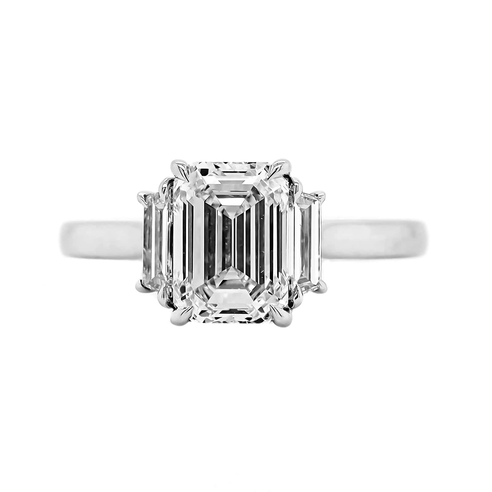 Platinum Emerald Cut and Trap Diamond Engagement Ring