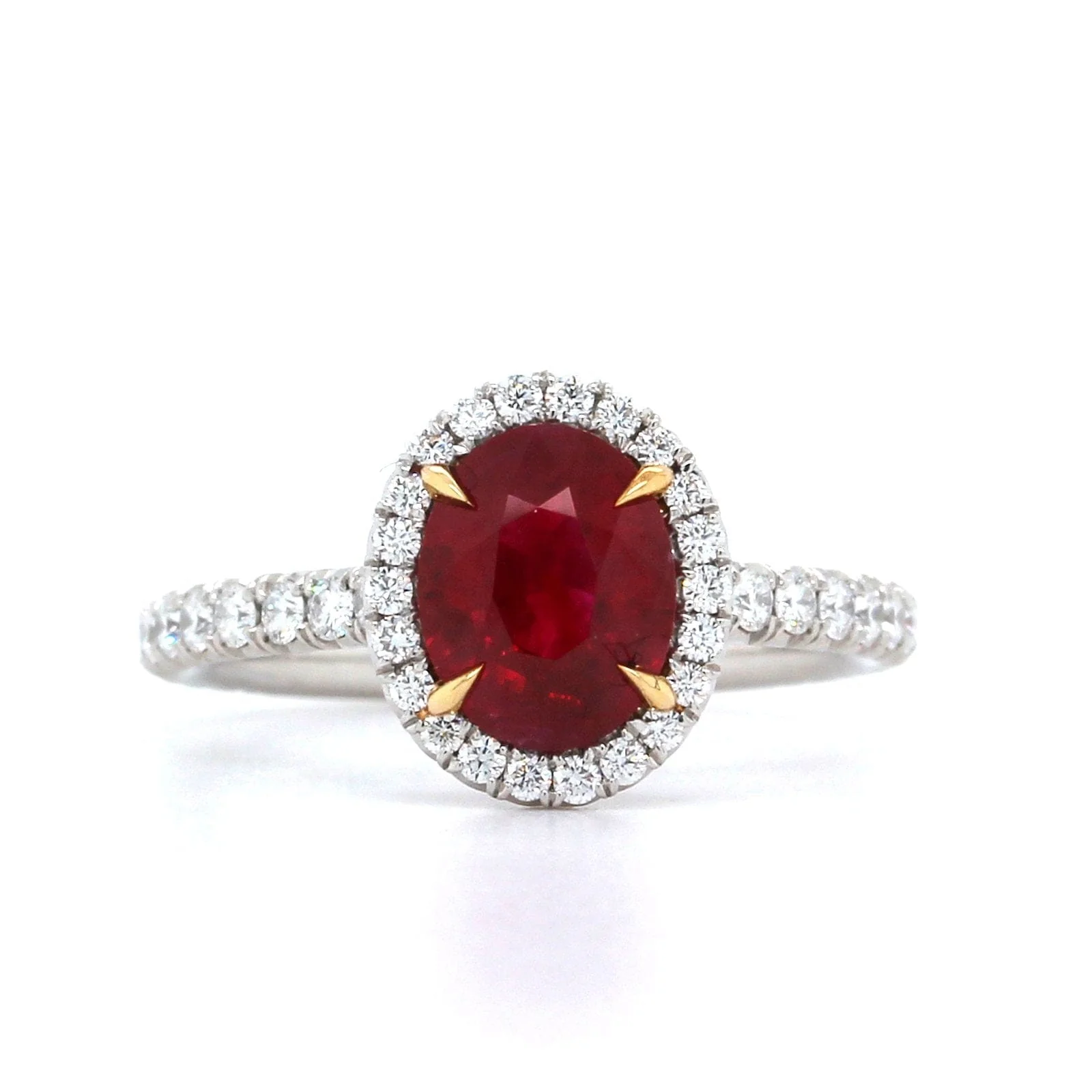 Platinum and 18K Yellow Gold Oval Ruby with Diamond Halo Ring