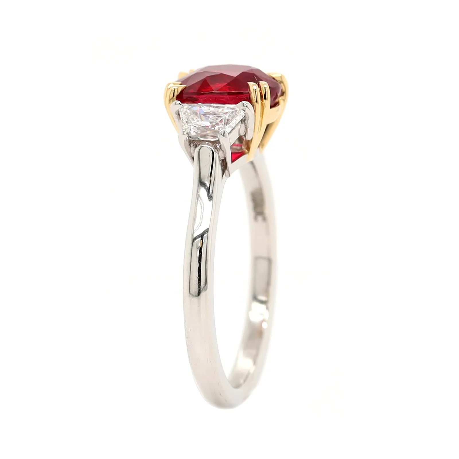 Platinum and 18K Yellow Gold Oval Ruby & Trap Cut Diamond Three Stone Ring - Image 2