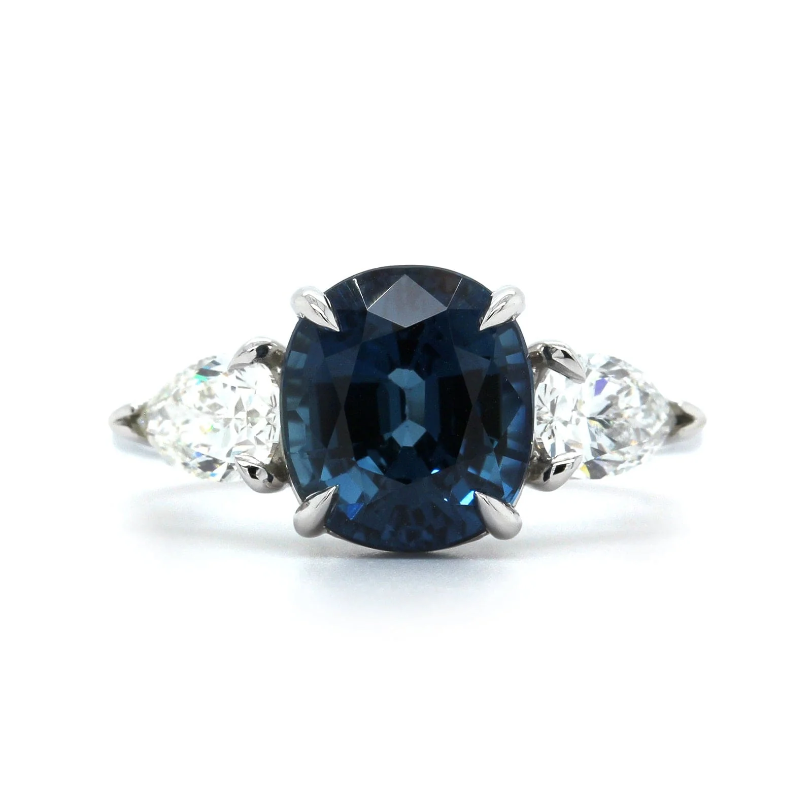 Platinum Cushion Sapphire and Diamond Ring