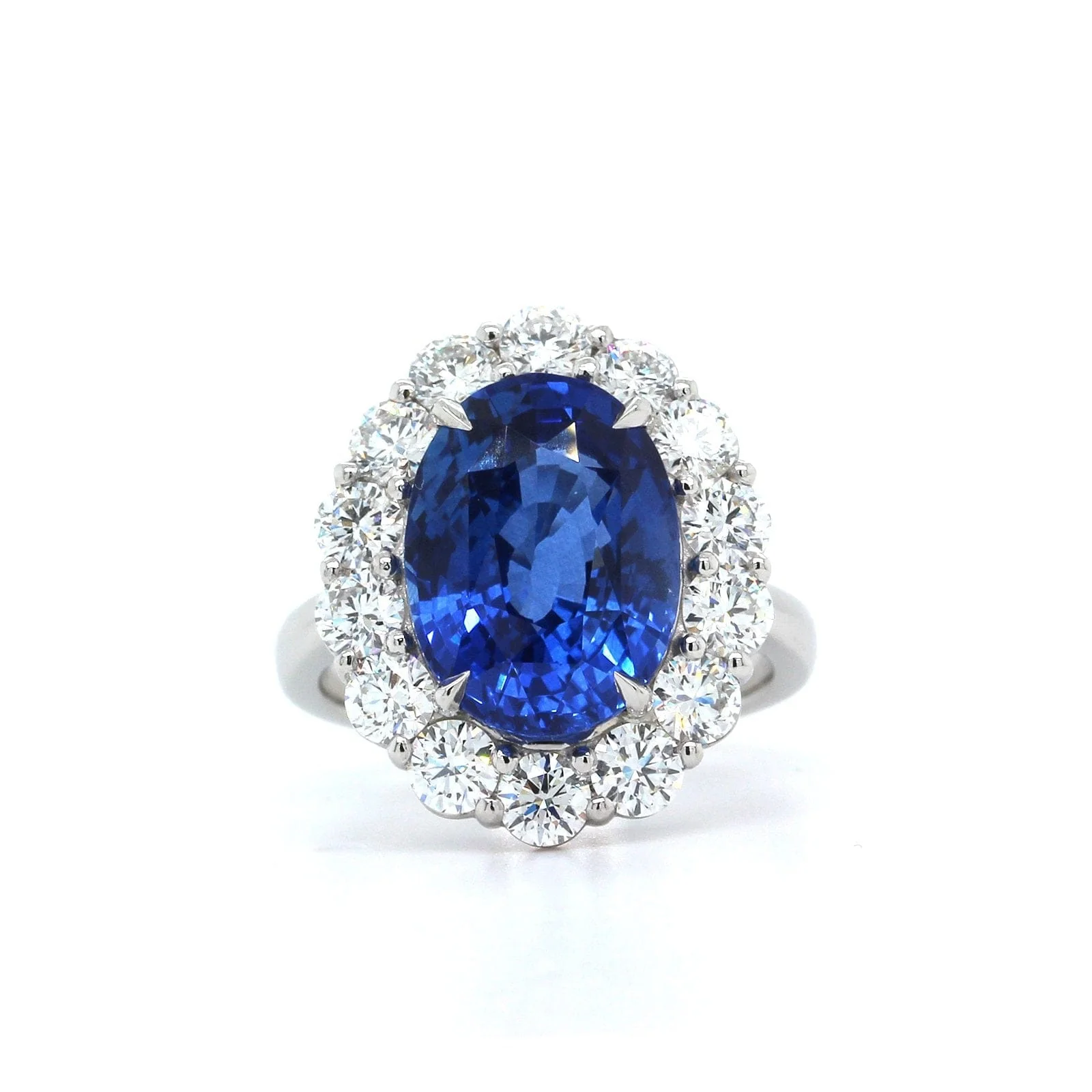 Platinum Oval Sapphire Diamond Halo Ring