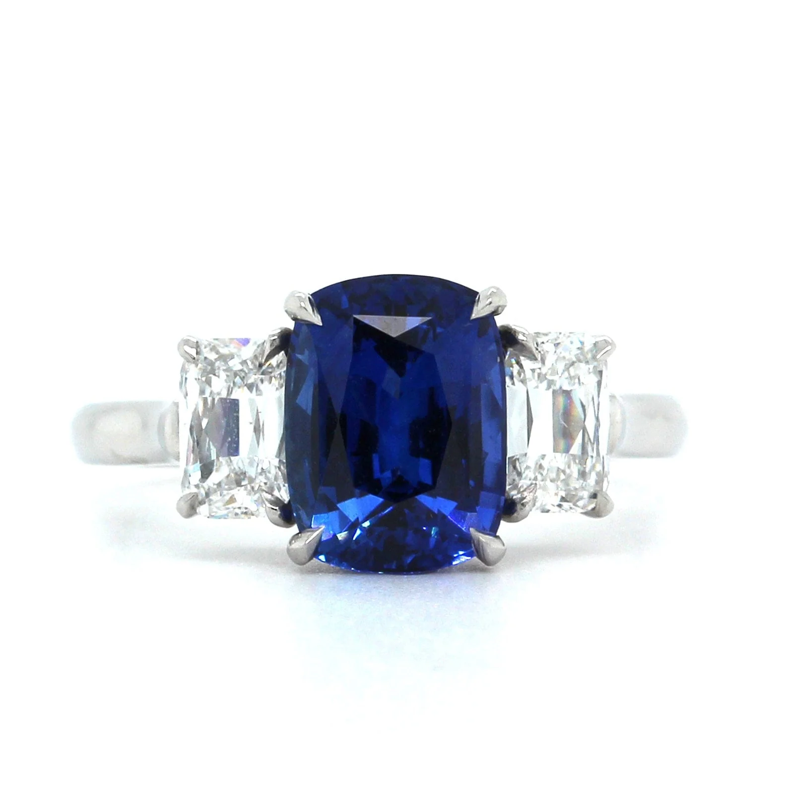 Platinum Cushion Sapphire Ring with Diamond Sides