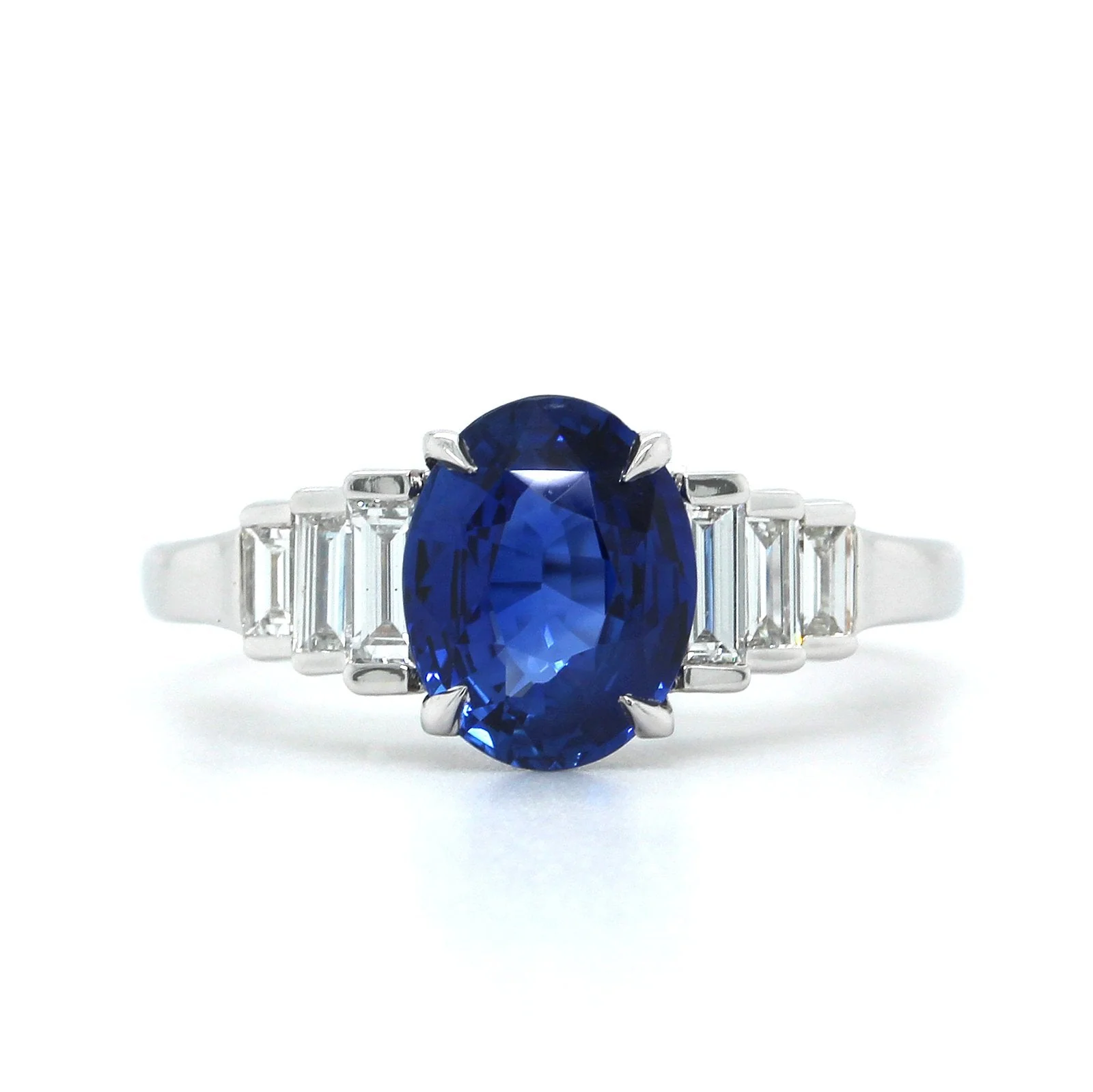 18K White Gold Oval Sapphire and Side Baguette Diamond Ring