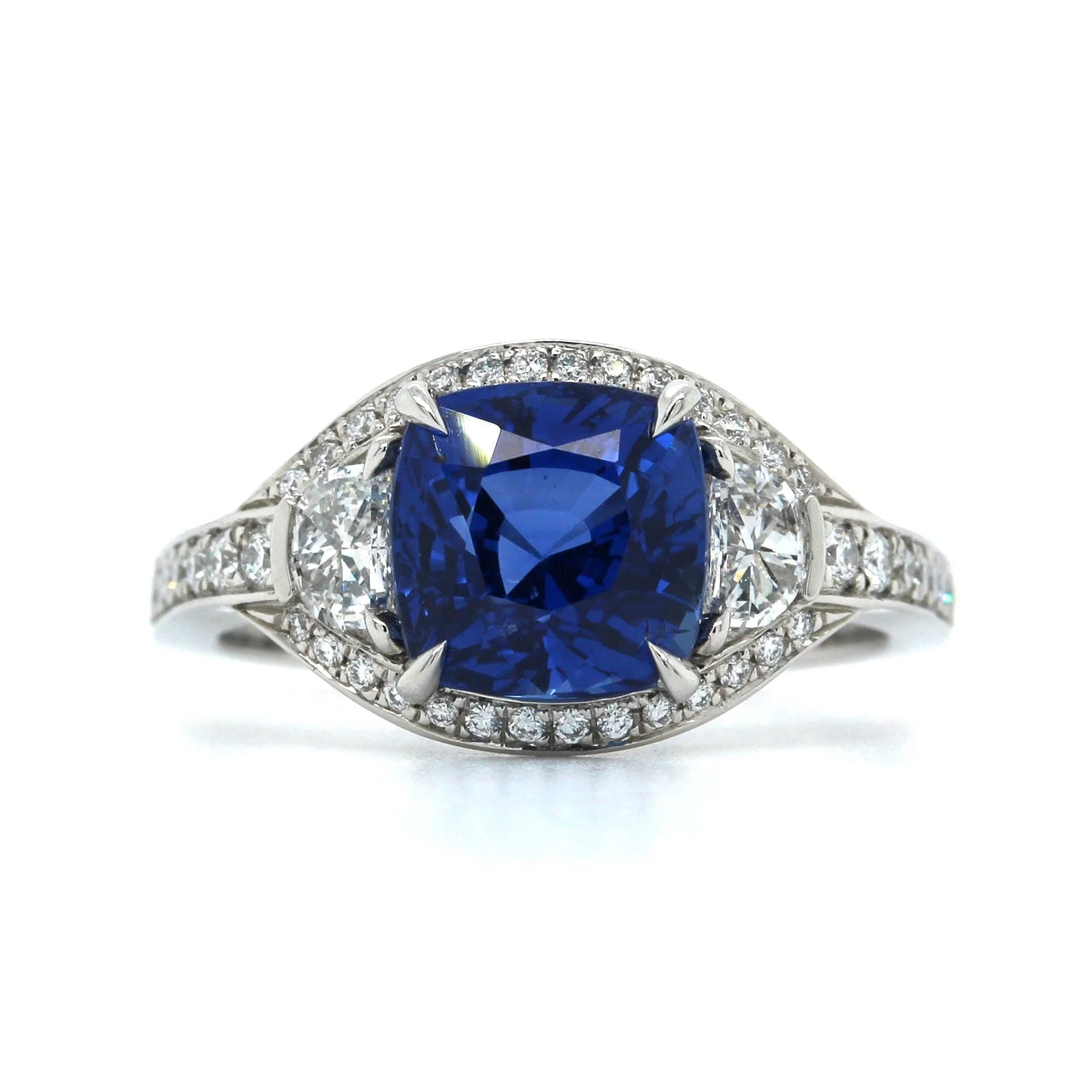 Platinum Blue Sapphire and Diamond Halo Ring