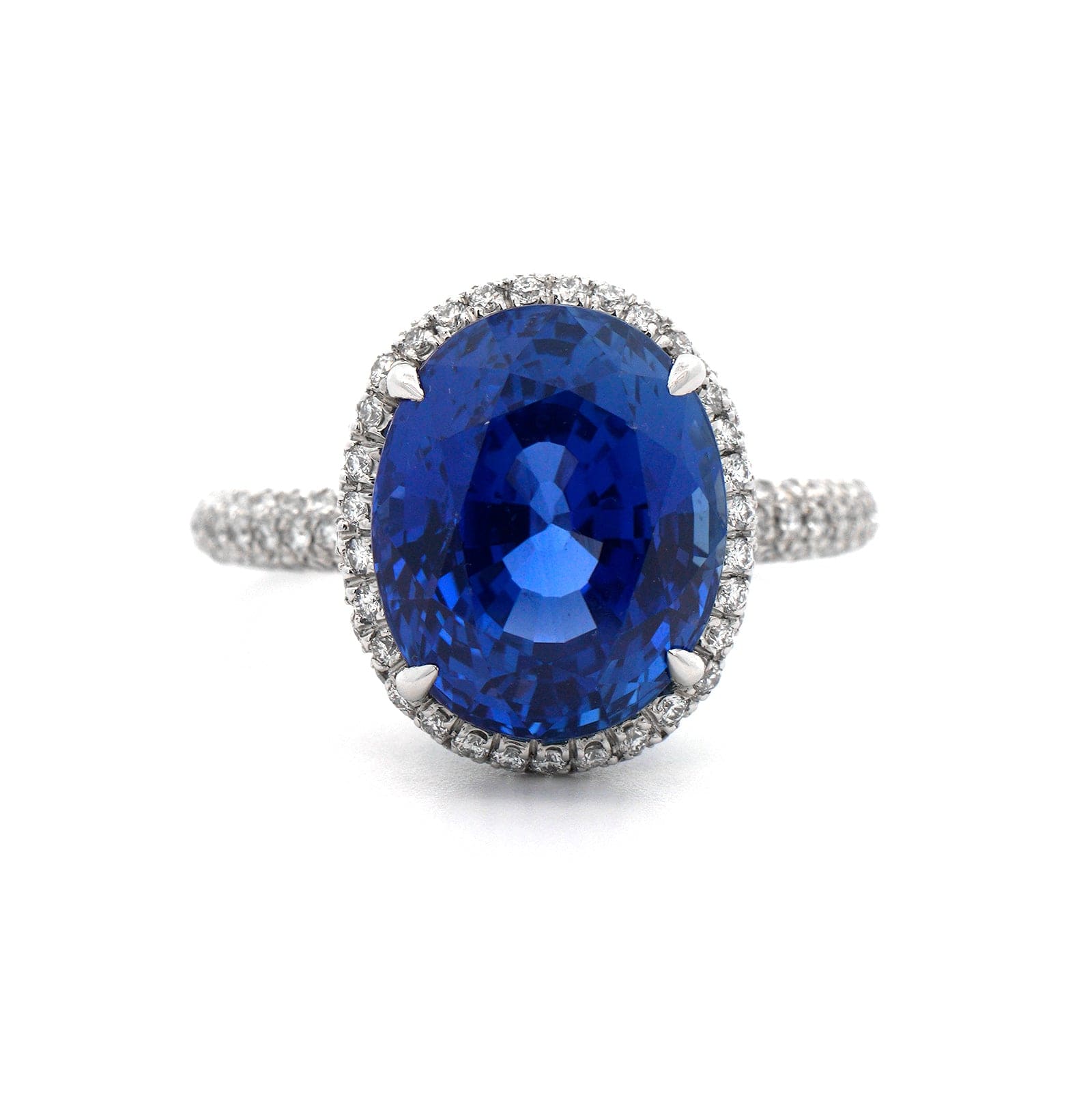 Platinum Oval Sapphire and Diamond Halo Ring
