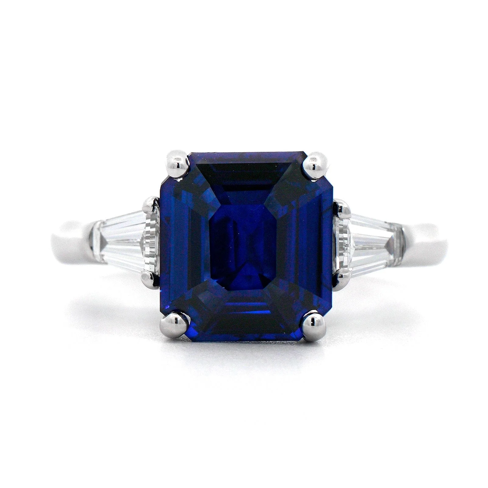 Platinum 3 Stone Emerald Cut Sapphire and Diamond Ring