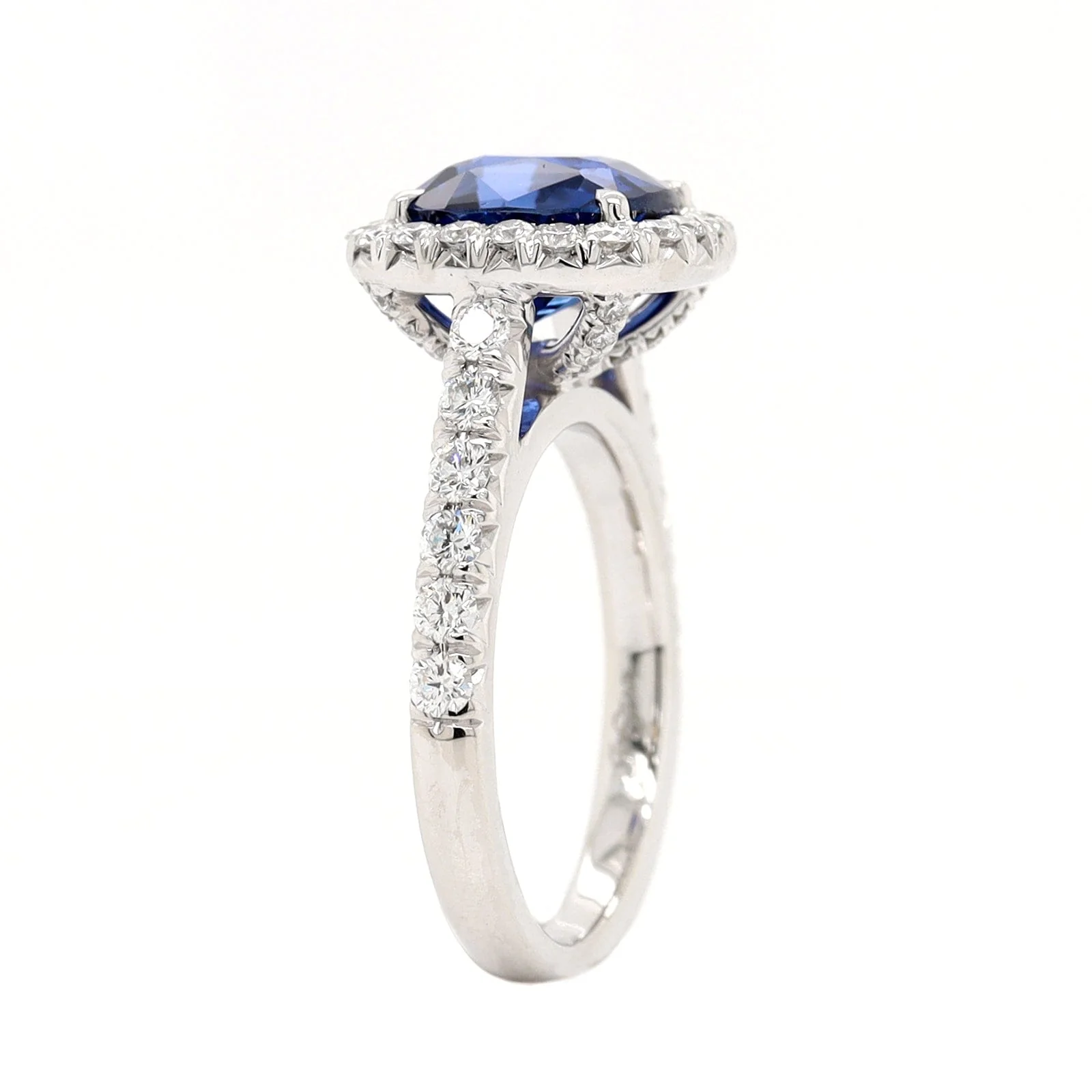 Platinum Cushion Cut Blue Sapphire and Diamond Halo Ring - Image 2