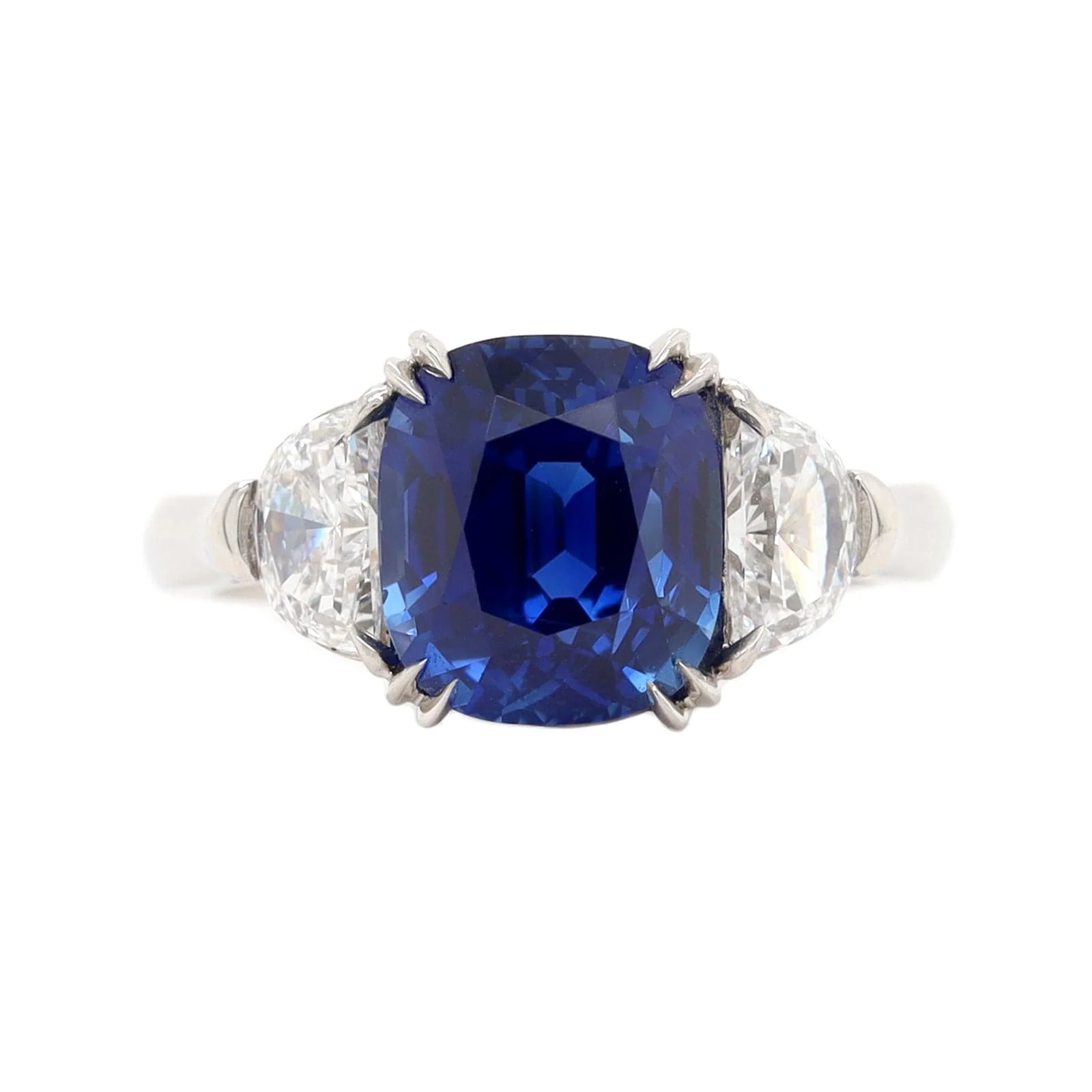 Platinum Cushion Cut Sapphire and Diamond Three Stone Ring
