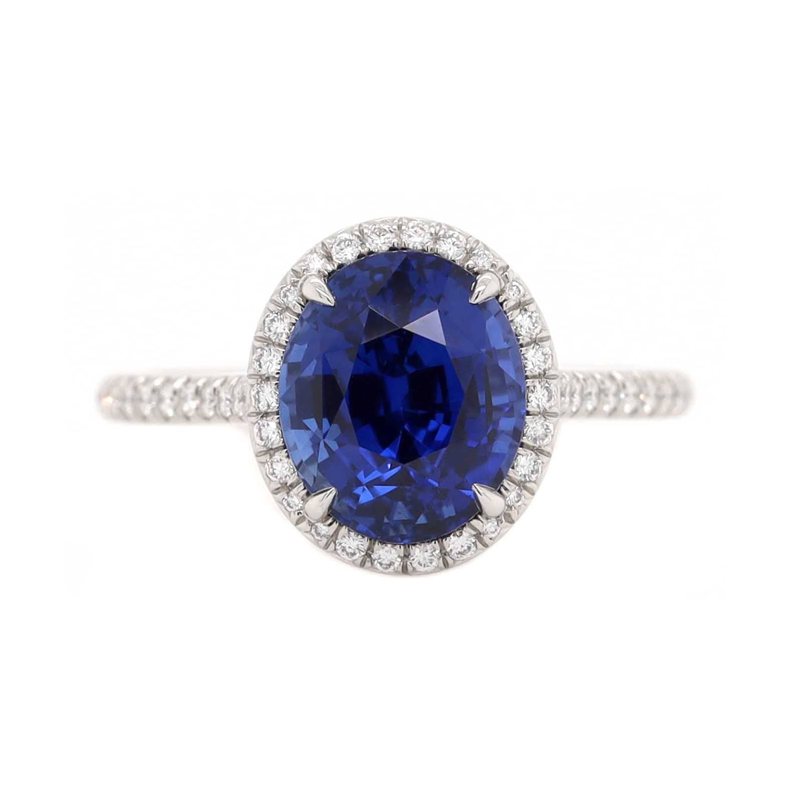 Platinum Oval Blue Sapphire and Diamond Halo Ring