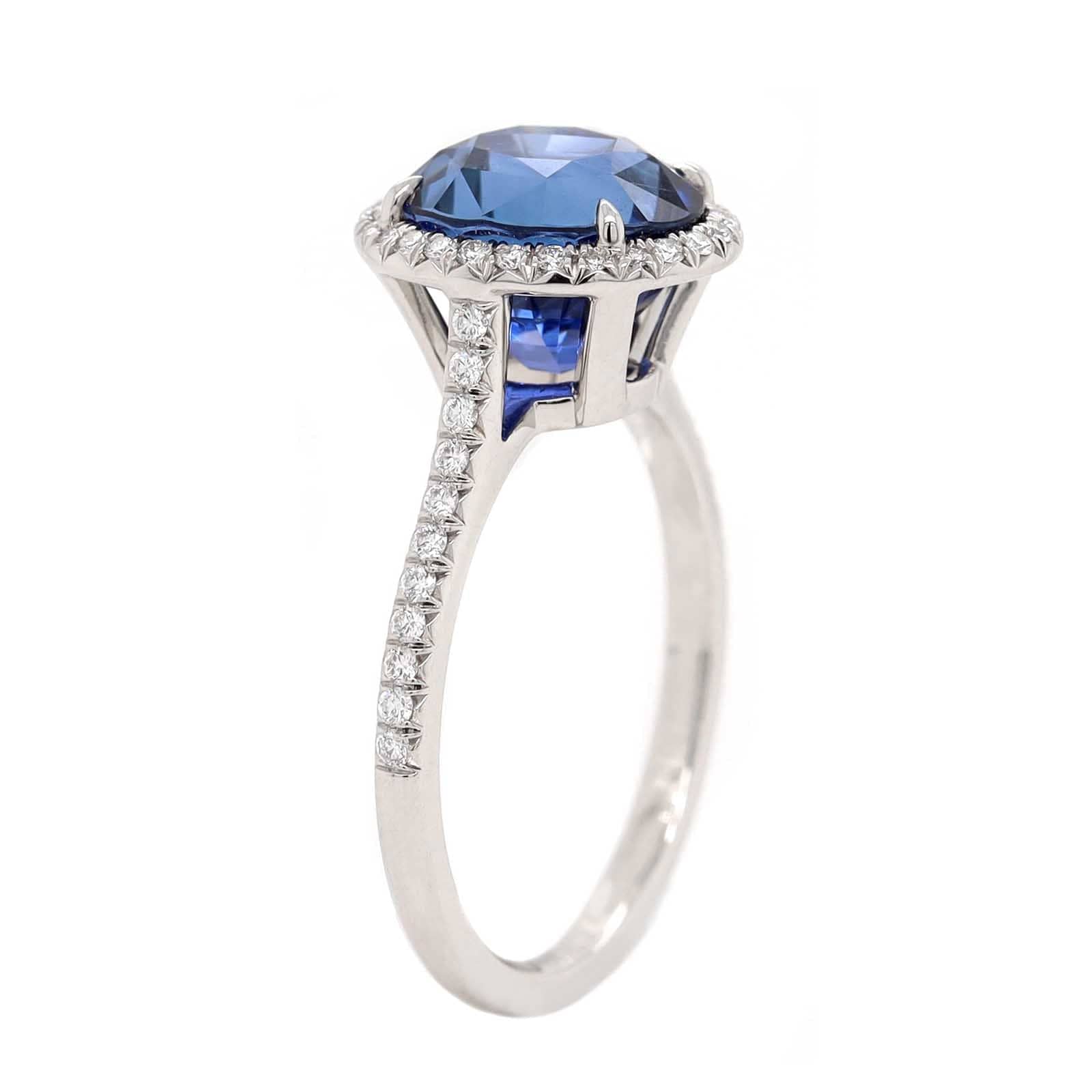 Platinum Oval Blue Sapphire and Diamond Halo Ring - Image 2