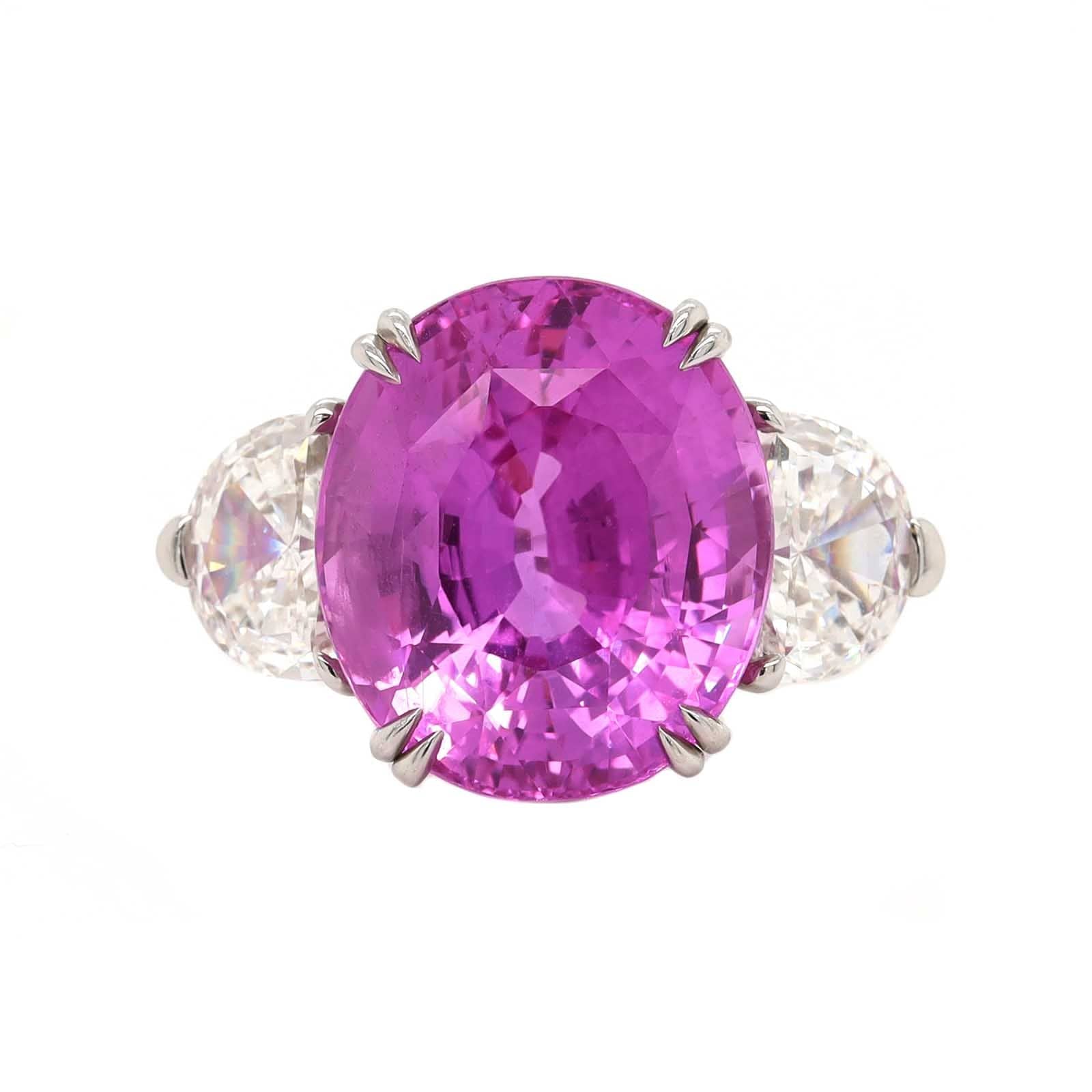 Platinum Three Stone Oval Shaped Pink Sapphire and Diamond Ring